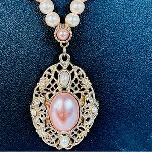 Vintage 1928 Faux Pink Pearl Pendant Necklace Oval Cabochon Filigree Signed 80s
